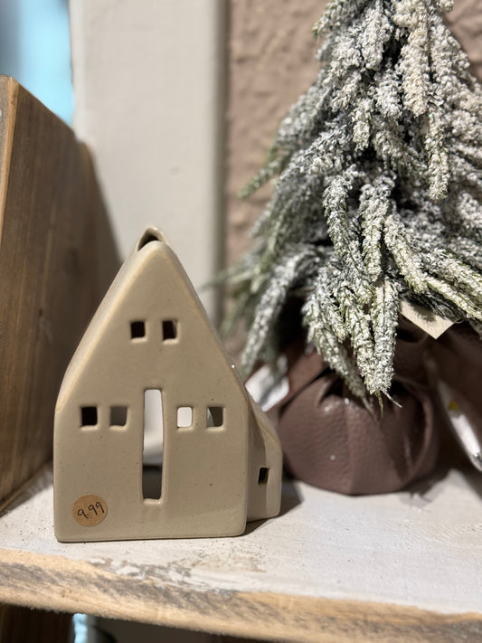 Glazed beige ceramic tea light house