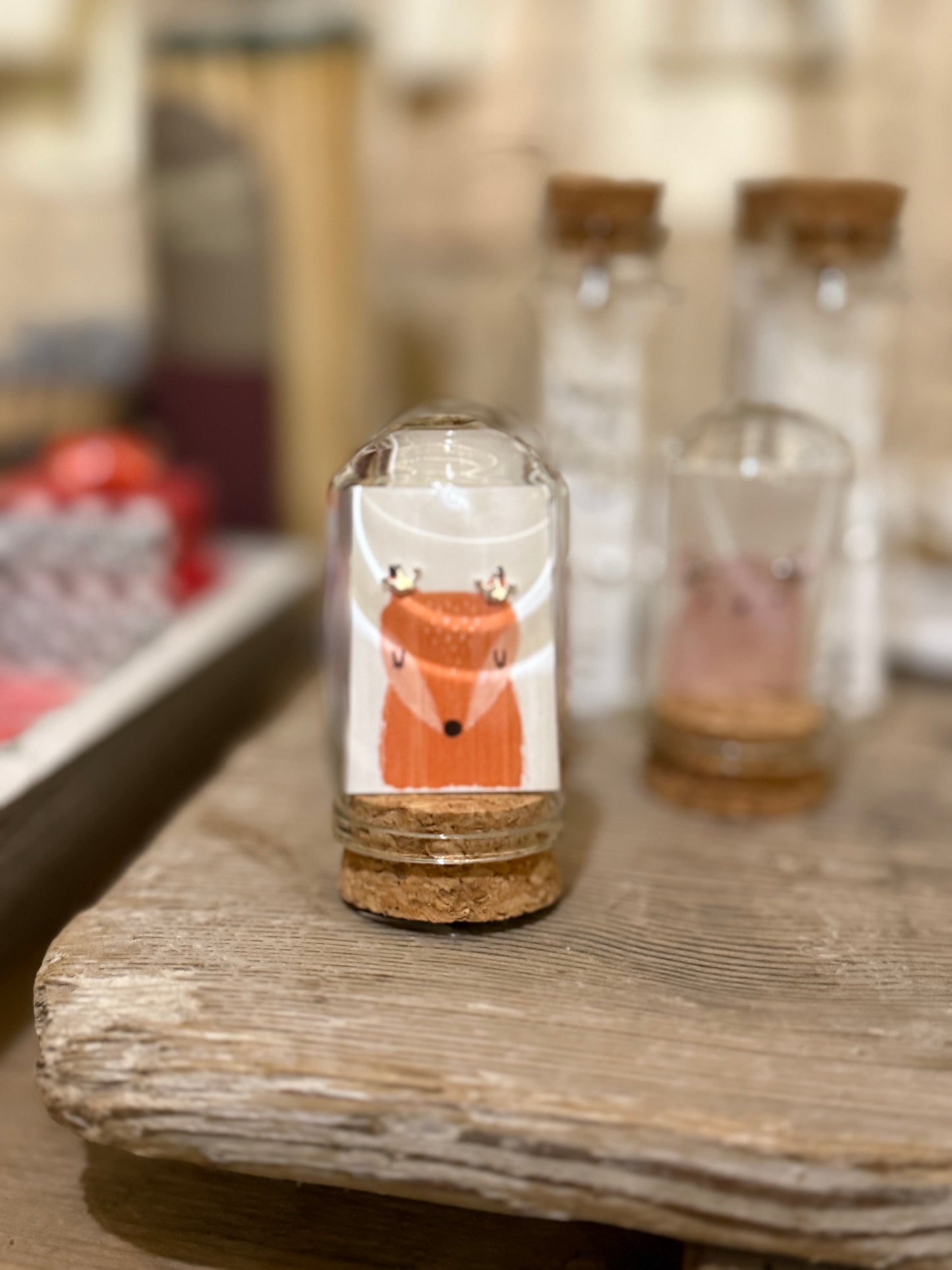 Fox with crown earrings In a message bottle